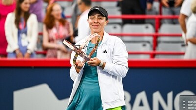 Jessica Pegula (USA) poses with her trophy after winning the singles final at IGA Stadium. Mandatory Credit (USA TODAY Sports via Reuters Con)