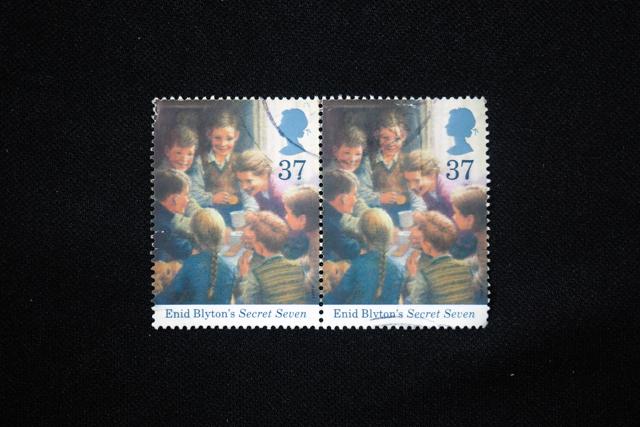 A UK postage stamp, circa 1997, featuring Enid Blyton’s Secret Seven series. (Nuntiya/Shutterstock) A UK postage stamp, circa 1997, featuring Enid Blyton’s Secret Seven series. (Nuntiya/Shutterstock)