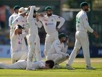 Pakistan's Naseem Shah lies on the ground as he reacts after third umpire ruled Sri Lanka's Ramesh Mendis as not out Pakistan's Naseem Shah lies on the ground as he reacts after third umpire ruled Sri Lanka's Ramesh Mendis as not out