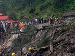 Rescue workers remove the debris as they search for survivors after a landslide following torrential rain in Shimla in the northern state of Himachal Pradesh, India, August 14, 2023. (Reuters)
