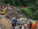 Rescue workers search for people feared missing in landslides following torrential rains, in Shimla, Rescue workers search for people feared missing in landslides following torrential rains, in Shimla,