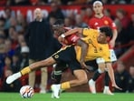 Manchester United's English defender #29 Aaron Wan-Bissaka (L) vies with Wolverhampton Wanderers' Brazilian midfielder #27 Matheus Nunes Manchester United's English defender #29 Aaron Wan-Bissaka (L) vies with Wolverhampton Wanderers' Brazilian midfielder #27 Matheus Nunes