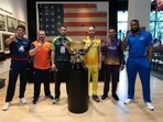 The captains gather around the Major League Cricket trophy The captains gather around the Major League Cricket trophy