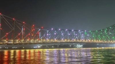 Howrah Bridge illuminated in Tri-color ahead of Independence Day 2023, in Kolkata on Monday. (ANI Photo) Howrah Bridge illuminated in Tri-color ahead of Independence Day 2023, in Kolkata on Monday. (ANI Photo)