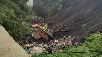Several houses collapsed due to a landslide in the Krishna Nagar area, in Shimla on Tuesday. (ANI)