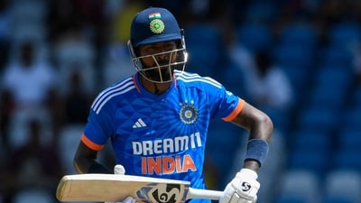 Hardik Pandya (L) of India walks off the field dismissed by Jason Holder (R) of West Indies (AFP) Hardik Pandya (L) of India walks off the field dismissed by Jason Holder (R) of West Indies (AFP)