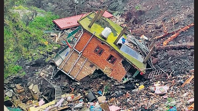 Collapsed houses seen after a landslide in Krishna Nagar, Shimla, on Tuesday. (ANI) Collapsed houses seen after a landslide in Krishna Nagar, Shimla, on Tuesday. (ANI)