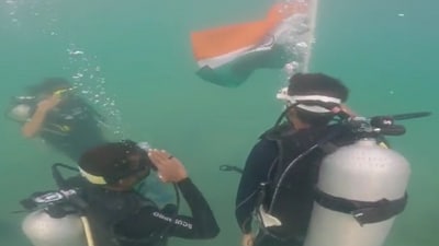 Snapshot of Indian Coast Guard hoisting the flag. (Twitter/@ANI) Snapshot of Indian Coast Guard hoisting the flag. (Twitter/@ANI)