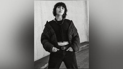 In this click, Jungkook slipped into another crop top featuring a crew neckline and styled it with denim jeans, a leather belt, Calvin Klein underwear, a cropped puffer jacket, ear hoops, a lip ring, and a messy hairdo. (Instagram/@calvinklein) In this click, Jungkook slipped into another crop top featuring a crew neckline and styled it with denim jeans, a leather belt, Calvin Klein underwear, a cropped puffer jacket, ear hoops, a lip ring, and a messy hairdo. (Instagram/@calvinklein)