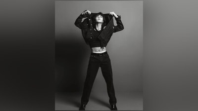 One of the pictures shows Jungkook in a cropped tank top showing off killer abs, layered with a denim jacket and matching denim jeans. He styled the ensemble with Chelsea boots, a scarf wrapped around his neck, hoop earrings, and rings. His retro-inspired curly locks stole the show. (Instagram/@calvinklein) One of the pictures shows Jungkook in a cropped tank top showing off killer abs, layered with a denim jacket and matching denim jeans. He styled the ensemble with Chelsea boots, a scarf wrapped around his neck, hoop earrings, and rings. His retro-inspired curly locks stole the show. (Instagram/@calvinklein)