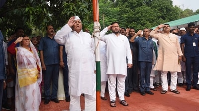 Rashtriya Janta Dal chief Lalu Prasad with wife Rabri Devi and Deputy Chief Minister Tejashwi Yadav salutes the national flag during the 77th Independence Day celebrations, in Patna. (PTI) Rashtriya Janta Dal chief Lalu Prasad with wife Rabri Devi and Deputy Chief Minister Tejashwi Yadav salutes the national flag during the 77th Independence Day celebrations, in Patna. (PTI)