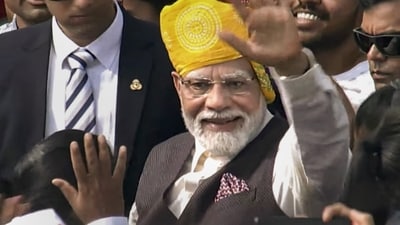 Prime Minister Narendra Modi waves as he leaves after his address to the nation on the occasion of the 77th Independence Day. (PTI)