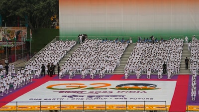Prime Minister Narendra Modi addressed the nation on the country's 77th Independence Day, in New Delhi. The G20 logo made from flowers is displayed on the ground. (PTI Photo) Prime Minister Narendra Modi addressed the nation on the country's 77th Independence Day, in New Delhi. The G20 logo made from flowers is displayed on the ground. (PTI Photo)