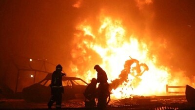 Firefighters work at the accident scene following an explosion at a gas station in the city of Makhachkala, Russia, in this handout picture published August 15, 2023. (Reuters)