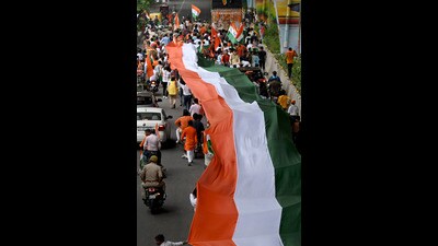Residents march with a huge Tricolour from Noida Stadium to Sector 30 on the occasion of Independence Day. (Sunil Ghosh/HT Photo) Residents march with a huge Tricolour from Noida Stadium to Sector 30 on the occasion of Independence Day. (Sunil Ghosh/HT Photo)