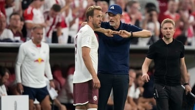 Bayern's head coach Thomas Tuchel talks to Bayern's Harry Kane during the German Super Cup final between FC Bayern Munich and RB Leipzig (AP)