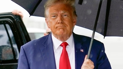 Former President Donald Trump walks to speak with reporters before boarding his plane at Ronald Reagan Washington National Airport, Aug. 3, 2023. (AP) Former President Donald Trump walks to speak with reporters before boarding his plane at Ronald Reagan Washington National Airport, Aug. 3, 2023. (AP)