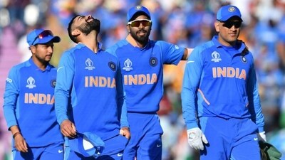 Virat Kohli (2L) with teammates Kuldeep Yadav (L) Hardik Pandya (2R) and Mahendra Singh Dhoni (R) (AFP) Virat Kohli (2L) with teammates Kuldeep Yadav (L) Hardik Pandya (2R) and Mahendra Singh Dhoni (R) (AFP)