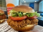 A Burger King sandwich is on display.