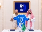 Brazilian forward Neymar (L) poses for a picture with Hilal President Fahad bin Nafel in Paris. Brazilian forward Neymar (L) poses for a picture with Hilal President Fahad bin Nafel in Paris.