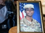 A portrait of American soldier Travis King is displayed.