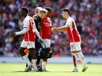 Arsenal's Jurrien Timber is substituted off after sustaining an injury