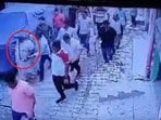 Plainclothed policemen after catching Bajrang Dal activist and cow vigilante Bittu Bajrangi on Tuesday.