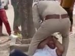 The video showed the cop in uniform severely slapping, punching and kicking a civilian who finally fell unconscious.