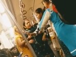 Women fighting on Delhi Metro over a space to stand. Women fighting on Delhi Metro over a space to stand.