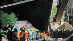 Rescuers at the building collapse scene. (NDRF)