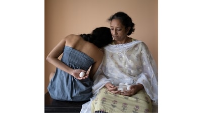 From, ‘Inheritance, Home series, Kolkata, 2021.’ Returning to live with her parents during the Covid-19 pandemic, artist Riti Sengupta found herself confronted with the weight of patriarchy hanging over the family home. Her series is an intergenerational dialogue between mother and daughter through collaborative performances. (Riti Sengupta) From, ‘Inheritance, Home series, Kolkata, 2021.’ Returning to live with her parents during the Covid-19 pandemic, artist Riti Sengupta found herself confronted with the weight of patriarchy hanging over the family home. Her series is an intergenerational dialogue between mother and daughter through collaborative performances. (Riti Sengupta)
