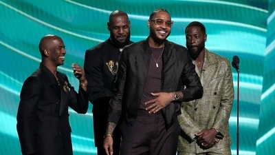 Former NBA basketball player Carmelo Anthony, center, speaks at the ESPY awards (AP) Former NBA basketball player Carmelo Anthony, center, speaks at the ESPY awards (AP)