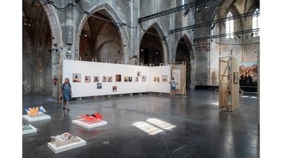 An installation view of the Louis Roederer Foundation Discovery Award exhibition at the 54th Rencontres d’Arles photography festival. It is in an emblematic place of the festival, the Eglise des Frères Prêcheurs, a gothic 15th century church, where curator Tanvi Mishra and scenographer Amanda Antunes highlight the emerging scene, in an innovative and sustainable way. (Adrien Limousin) An installation view of the Louis Roederer Foundation Discovery Award exhibition at the 54th Rencontres d’Arles photography festival. It is in an emblematic place of the festival, the Eglise des Frères Prêcheurs, a gothic 15th century church, where curator Tanvi Mishra and scenographer Amanda Antunes highlight the emerging scene, in an innovative and sustainable way. (Adrien Limousin)