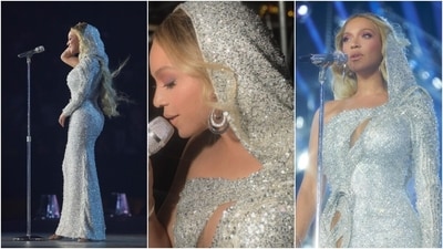 The third look shows Beyoncé in the Moondust Crystal Encrusted Orbit Gown from Hiranyagarbha. She wore it for the opening look in Atlanta. It features a hood covering her head, crystal and sequin embellishments, a one-shoulder neckline, cut-outs on the front, a full-length sleeve, a form-fitting silhouette, and a floor-length hem. (Instagram/@beyonce) The third look shows Beyoncé in the Moondust Crystal Encrusted Orbit Gown from Hiranyagarbha. She wore it for the opening look in Atlanta. It features a hood covering her head, crystal and sequin embellishments, a one-shoulder neckline, cut-outs on the front, a full-length sleeve, a form-fitting silhouette, and a floor-length hem. (Instagram/@beyonce)