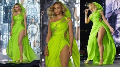 The second Gaurav Gupta look featured Beyoncé in a neon green saree gown from the designer's Hiranyagarbha collection from Paris Couture Week. It features a one-shoulder neckline, swirl structures, cut-out details exposing her decolletage and waist, full frontal thigh-slit, a cape on the back with a hood covering her head, and a figure-hugging fitting. (Instagram/@beyonce) The second Gaurav Gupta look featured Beyoncé in a neon green saree gown from the designer's Hiranyagarbha collection from Paris Couture Week. It features a one-shoulder neckline, swirl structures, cut-out details exposing her decolletage and waist, full frontal thigh-slit, a cape on the back with a hood covering her head, and a figure-hugging fitting. (Instagram/@beyonce)