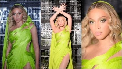 Beyoncé wore the saree gown with mesh stockings, shimmering gold body glitter, a statement silver bracelet, diamond rings, embellished diamond ear cuffs, and strappy neon green high heels. Muted green eye shadow, nude lips, cat eyeliner, mascara on the lashes, open curly hair, rouged cheeks, and highlighter completed the glam picks. (Instagram/@beyonce) Beyoncé wore the saree gown with mesh stockings, shimmering gold body glitter, a statement silver bracelet, diamond rings, embellished diamond ear cuffs, and strappy neon green high heels. Muted green eye shadow, nude lips, cat eyeliner, mascara on the lashes, open curly hair, rouged cheeks, and highlighter completed the glam picks. (Instagram/@beyonce)