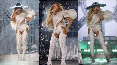 The first look shows Beyoncé dressed in the Infinity Crystal Bodysuit paired with Crystal Legging Boots on stage during the Renaissance World Tour Concert. The pearl white-coloured bodysuit features a sleeveless design, a structured OTT statement sleeve extending towards her full torso, a cut-out on the waist embellished with a see-through mesh, shimmering crystal embellishments, high-leg cut-outs, and a figure-hugging silhouette. (Instagram/@beyonce) The first look shows Beyoncé dressed in the Infinity Crystal Bodysuit paired with Crystal Legging Boots on stage during the Renaissance World Tour Concert. The pearl white-coloured bodysuit features a sleeveless design, a structured OTT statement sleeve extending towards her full torso, a cut-out on the waist embellished with a see-through mesh, shimmering crystal embellishments, high-leg cut-outs, and a figure-hugging silhouette. (Instagram/@beyonce)