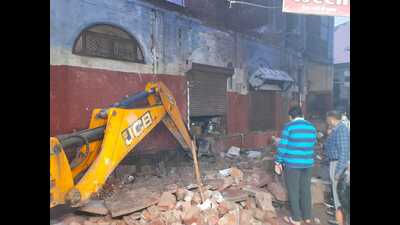 Debris of the house being removed after the tragic incident in Vrindavan on Tuesday. (HT)