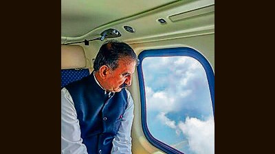 Himachal Pradesh chief minister Sukhvinder Singh Sukhu conducts an aerial survey of the flood-hit areas in Kangra district on Wednesday. (PTI) Himachal Pradesh chief minister Sukhvinder Singh Sukhu conducts an aerial survey of the flood-hit areas in Kangra district on Wednesday. (PTI)