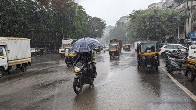 Motorists wade through a waterlogged road in Yerawada in July. There has been less rain in the city in August, said IMD. (HT FILE PHOTO)