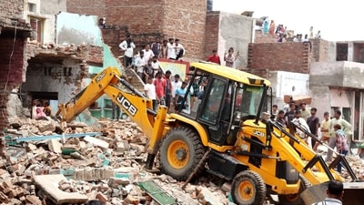 On Wednesday morning, bulldozers converged near Sri Krishna Janmbhoomi in Mathura. (HT Photo) (HT_PRINT) On Wednesday morning, bulldozers converged near Sri Krishna Janmbhoomi in Mathura. (HT Photo) (HT_PRINT)