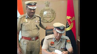 Shatrujeet Singh Kapur, a 1990-batch IPS officer, taking charge as the new Haryana director general of police (DGP) on Wednesday as his predecessor PK Agrawal (left) looks on. (Sant Arora/HT Photo) Shatrujeet Singh Kapur, a 1990-batch IPS officer, taking charge as the new Haryana director general of police (DGP) on Wednesday as his predecessor PK Agrawal (left) looks on. (Sant Arora/HT Photo)