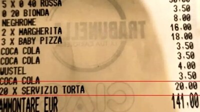 Viral image of the restaurant bill showing charge for slicing a cake. Viral image of the restaurant bill showing charge for slicing a cake.