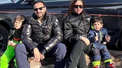 Saif Ali Khan poses with wife Kareena Kapoor Khan and sons Jeh and Taimur.