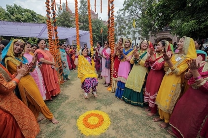 Women embrace tradition and devotion during Hariyali Teej celebrations. (ANI Photo) Women embrace tradition and devotion during Hariyali Teej celebrations. (ANI Photo)