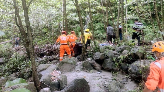 Uttarakhand SDRF and NDRF conduct a search operation following a landslide due to rains at Gaurikund in Rudraprayag on Tuesday. (ANI)