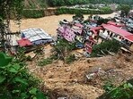 Buildings washed away in Mandi in Himachal Pradesh after torrential rains. (REUTERS) Buildings washed away in Mandi in Himachal Pradesh after torrential rains. (REUTERS)