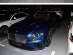 Luxury vehicles seized during a police raid, in Singapore, in this handout picture released on August 16.