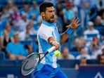 Novak Djokovic returns a shot against Alejandro Davidovich Fokina (ESP) during the Western and Southern Open