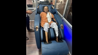A passenger experiencing the massage chair at Lucknow’s Charbagh railway station (HT Photo)